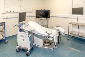 State-of-the-art ultrasound and treatment room at Care Fertility Cheshire, Warrington — advanced fertility technology in a private, comfortable setting.