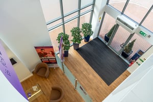 Main entrance and reception at Care Fertility Cheshire, located in Daresbury Park, Warrington — accessible fertility clinic for patients across Cheshire and Merseyside.