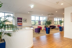 Modern upstairs waiting area at Care Fertility Cheshire, Warrington — bright, comfortable environment for fertility consultations and appointments.