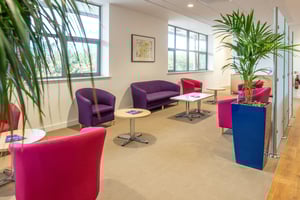 Comfortable and bright waiting area at Care Fertility with seating for patients and a calm, welcoming atmosphere.