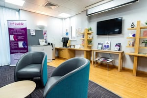 Comfortable and bright waiting area at Care Fertility with seating for patients and a calm, welcoming atmosphere.