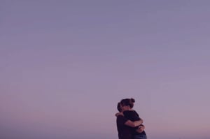 A couple hugging each other
