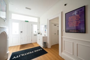 Bright entrance hall at Care Fertility Tunbridge Wells with a Care Fertility doormat