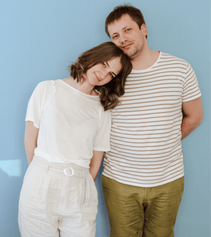 Young couple in front of blue background-1