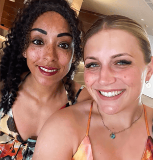 Fran and Jess smiling together in a close-up selfie.